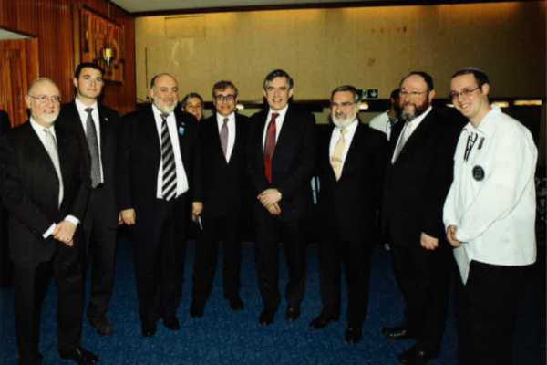 Dignitaries including Prime Minister Gordon Brown, Ambassador Ron Proser, Chief Rabbis Lord Sacks and Mirvis, and Mazkir Simon Levy