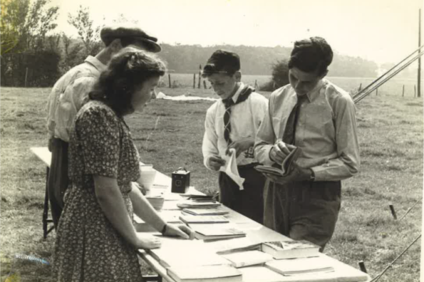 Summer Camps at Thaxted took place from 1944-1962. Here some chaverim collect sefarim for their daily activities.